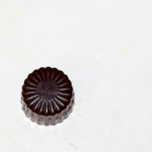 Round fluted handmade chocolate bonbon